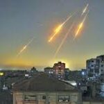 Current image: The Middle East conflict has spiraled into an open war as Iran launched retaliatory ballistic missile and drone strikes against United States military installations in Bahrain, Kuwait, and Jordan, forcing regional states to activate their air defense grids.